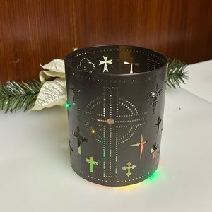 Celebrating Home Brown metal Crosses cut out Candle sleeve